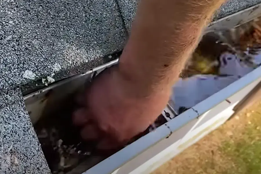 Gutter Cleaning work on a residential gutter system