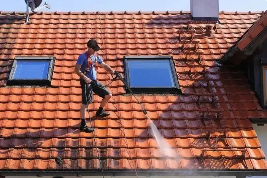 Roof Cleaning in Greensboro, NC — residential gutter and downspout work